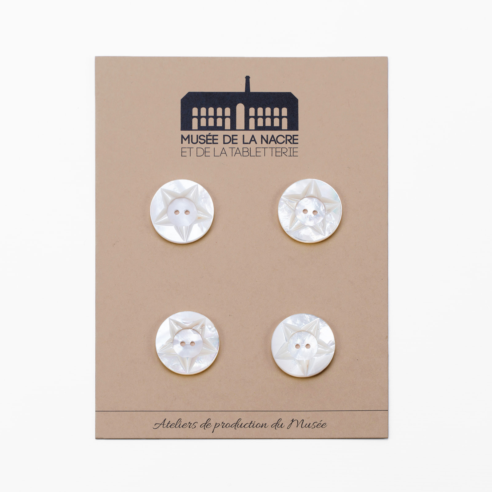 Boutons étoile nacre blanche 23mm (x4)